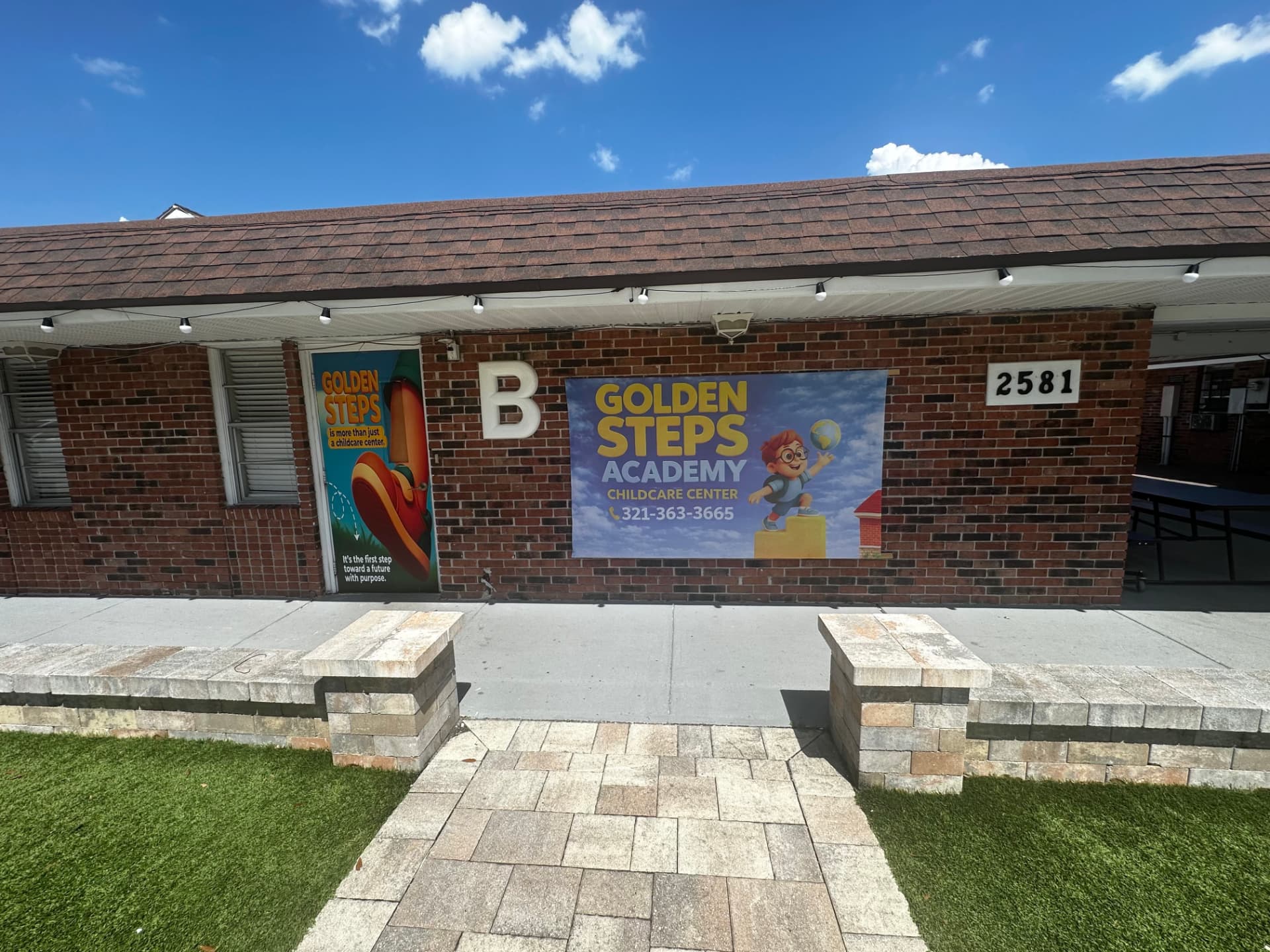 Golden Steps Academy brick building entrance on Sanford Avenue